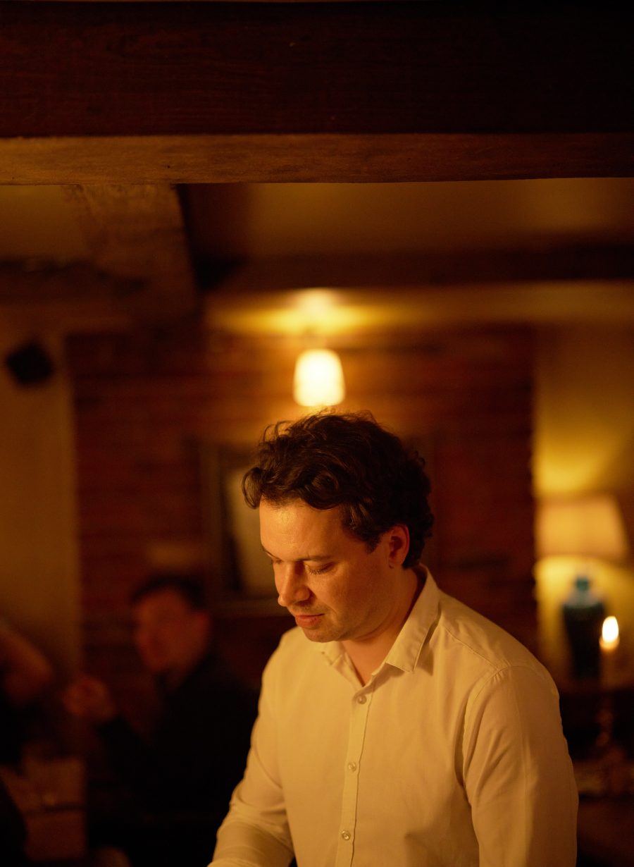 staff serving drinks at the bar